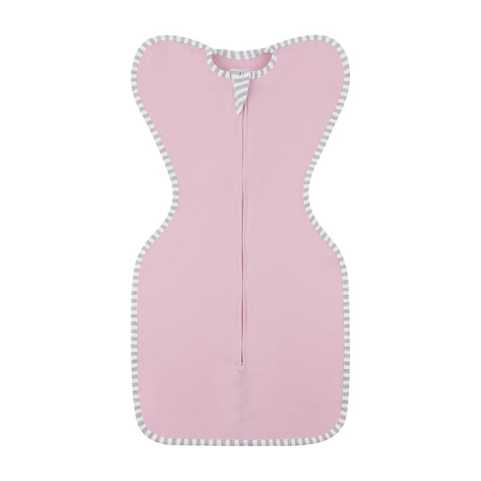 Pink baby sleeping bag with white trim on a white background